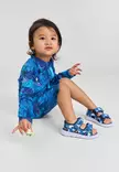 Reima Moomin Sandig UV-uimapuku Turquoise Blue lapsen yllä. - Baddräkter och UV-kläder - 5200357A-6151 - 2