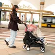 Sadesuoja Stokke YoYo5 rattaissa lapsella. - Regnskydd till vagnar och barnvagnar - 717301 - 2