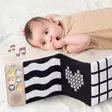 Taf Toys ensikirja Soothing Sounds Book, kontrastiset kuvat. - Aktivitetsböcker - 303944 - 3