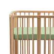 Stokke Nighti muotolakana Sage Green 60x120cm sängyssä. - Påslakan och underlakan - 710804 - 2